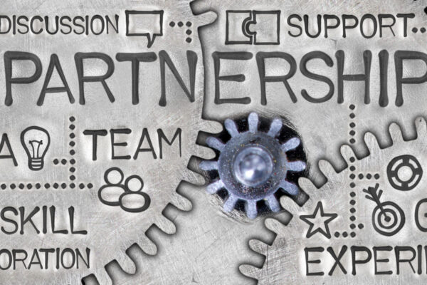 Macro,Photo,Of,Tooth,Wheel,Mechanism,With,Partnership,Related,Words