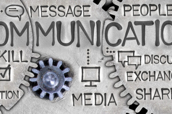 Macro,Photo,Of,Tooth,Wheel,Mechanism,With,Communication,Concept,Related