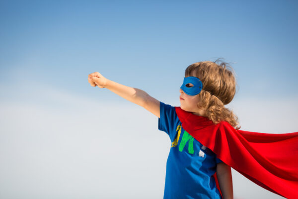 Superhero,Kid,Against,Blue,Sky,Background.,Girl,Power,Concept